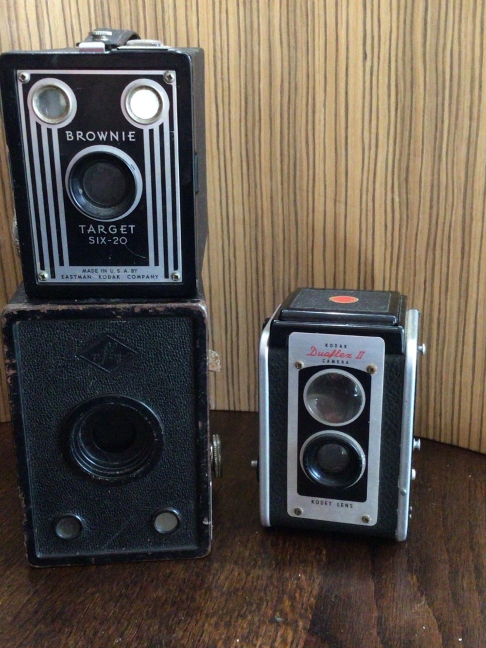 Three vintage camera things. Sold as is for parts or decor.
